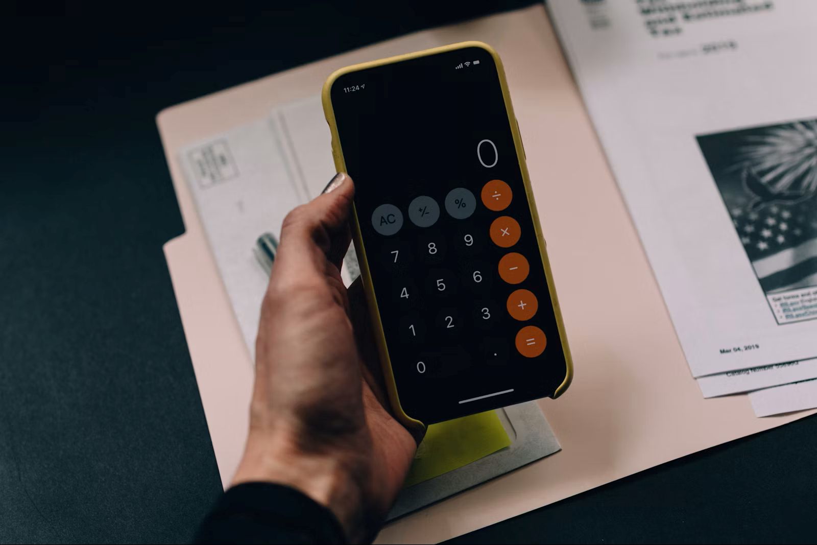Desk with calculator and document